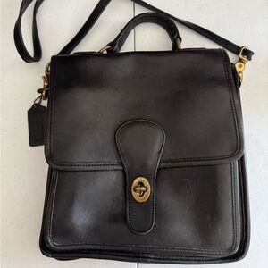 Coach Vintage Black Leather Handbag with Gold Accents